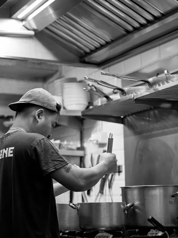 Le Moline chef at the stove, kitchen open all day